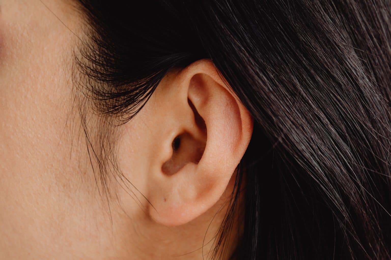 Close up of a woman's ear.