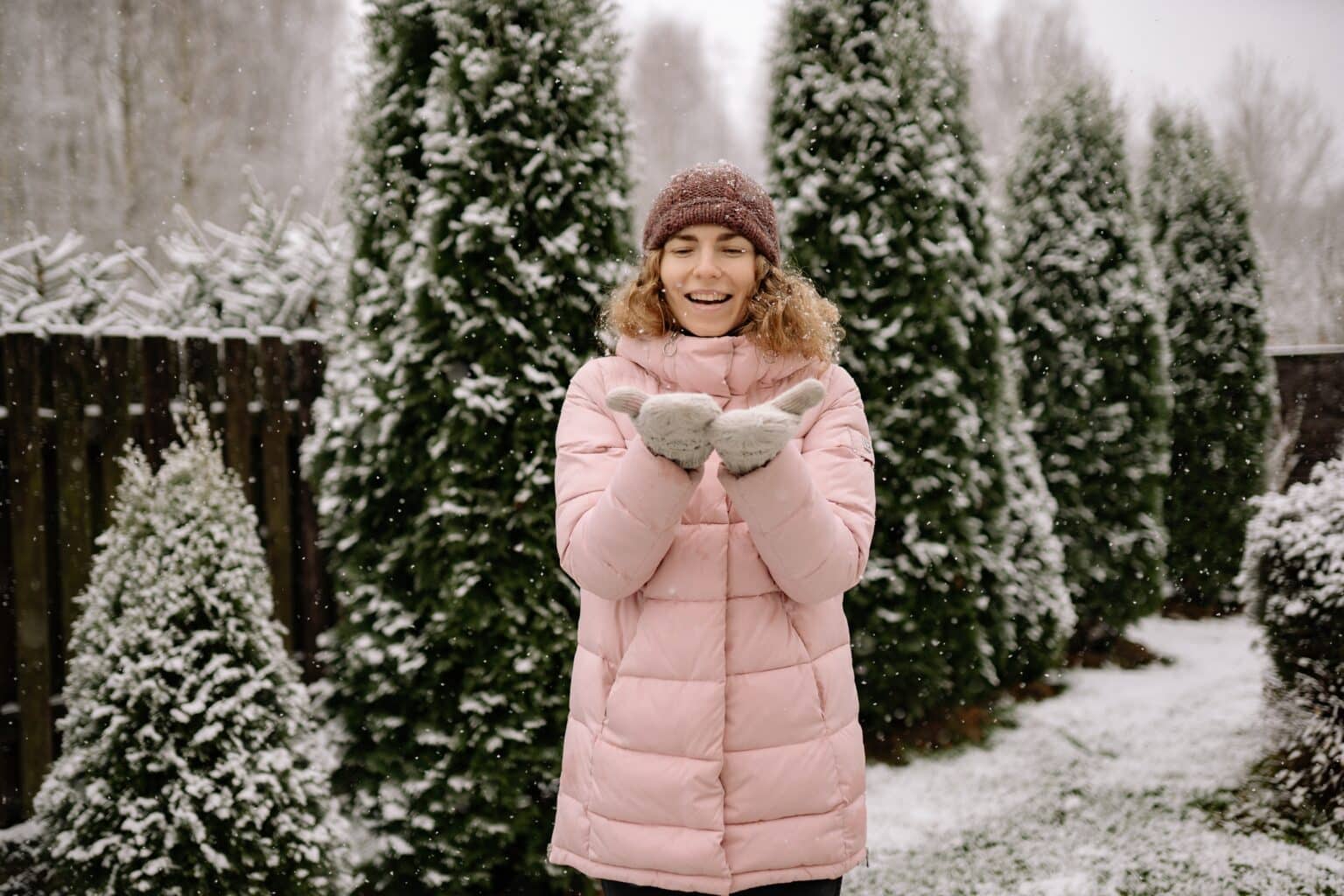 Woman outside in the snow.